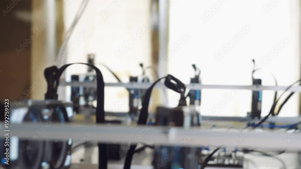 Man checks the temperature of the graphics cards on the computer. Bitcoin cryptocurrency mining farm Man checks the temperature of the graphics cards on the computer. Bitcoin cryptocurrency mining farm