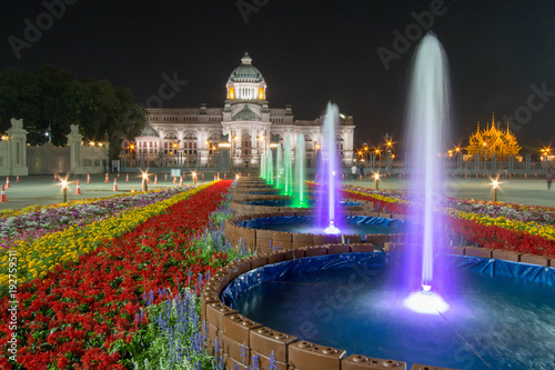 Bangkok, Thailand - February 6, 2018 : Fountain and colorful flowers with Ananta Samakhom Throne Hall in the background, Bangkok, Thailand.