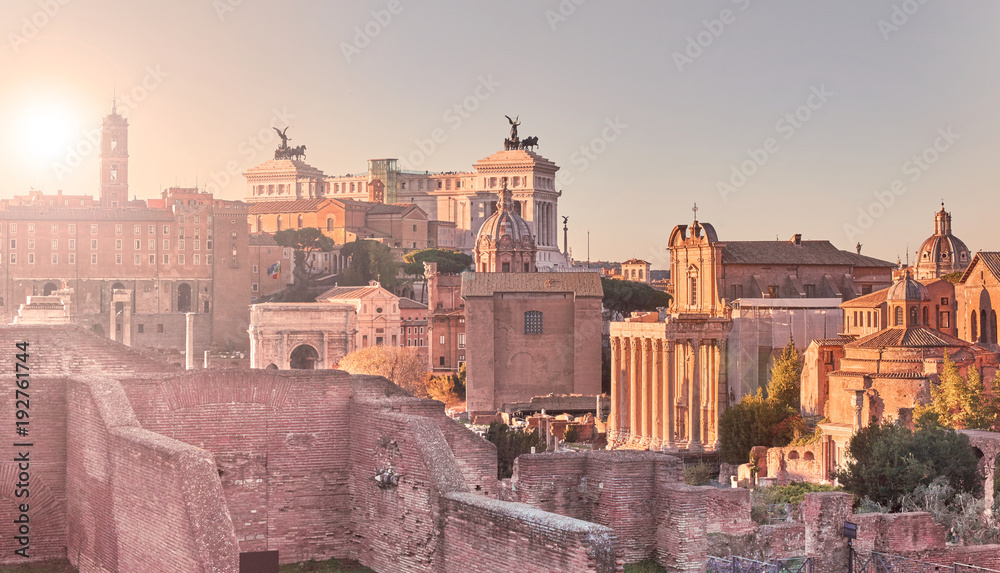 Rome, view from the imperial holes, Altar of the Homeland, churches, Imperial Forums at sunset.