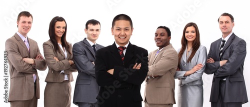 businessman standing in front of his business team