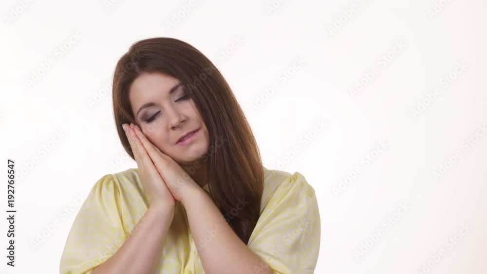 Woman sleepy tired girl falling asleep. Female student with lack of slumber on white. Health balance sleep deprivation concept. 4K ProRes HQ codec Woman sleepy tired girl falling asleep. Female student with lack of slumber on white. Health balance sleep deprivation concept. 4K ProRes HQ codec