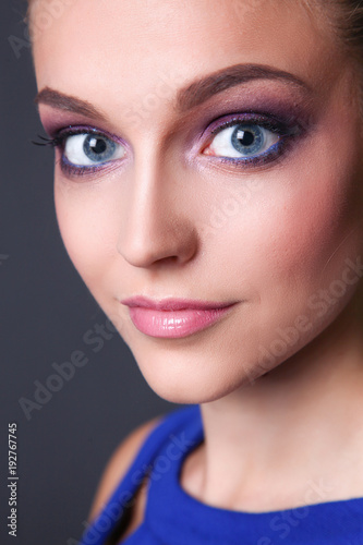 Studio shot of a beautiful young woman wearing professional makeup.