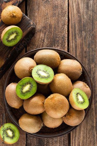Kiwi fruit on wooden rustic table, ingredient for detox smoothie