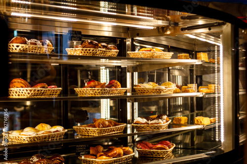 Showcase pastry shop, a lot of different cakes and pastries, desserts