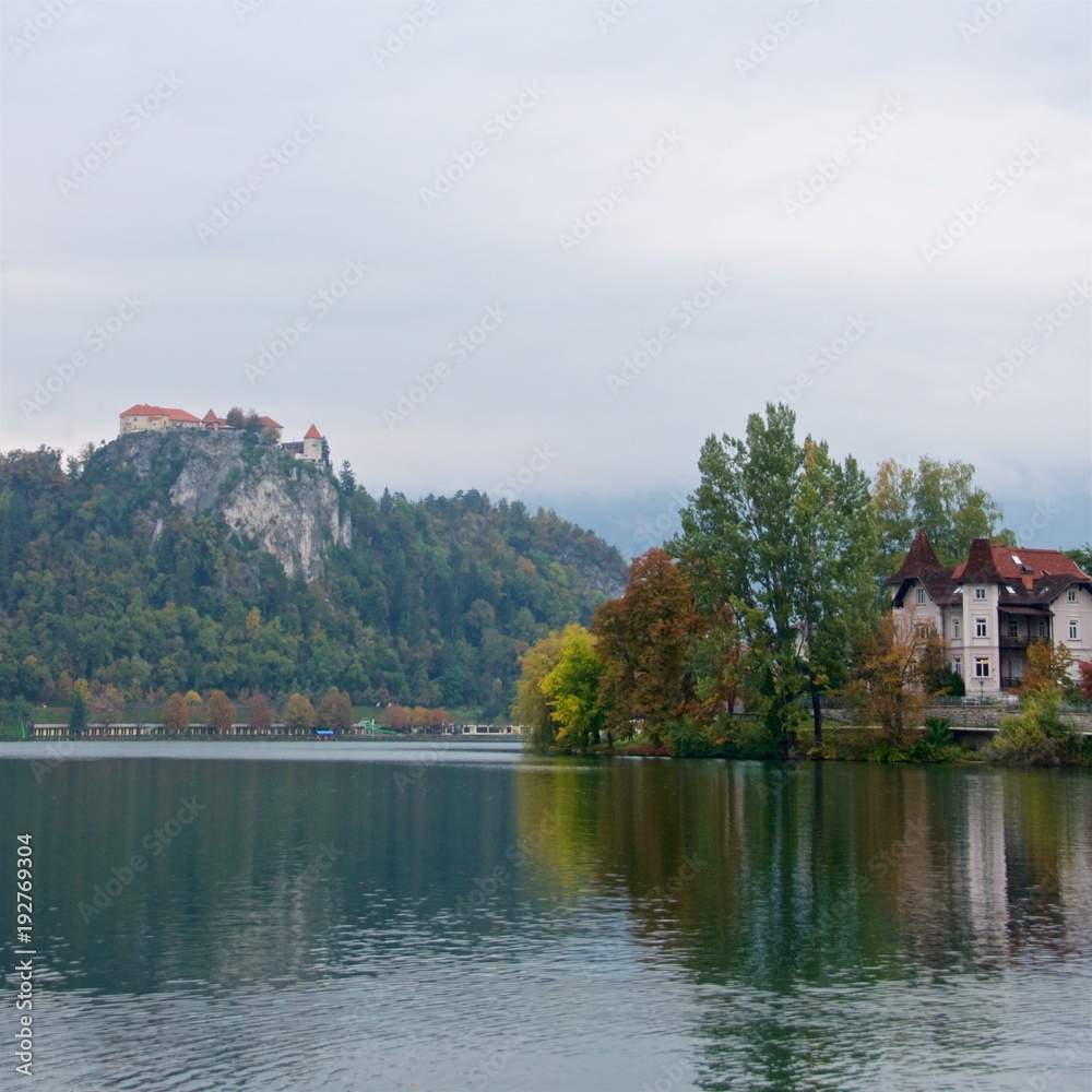 The city of Bled surrounding Lake Bled with Bled Castle on the precipice