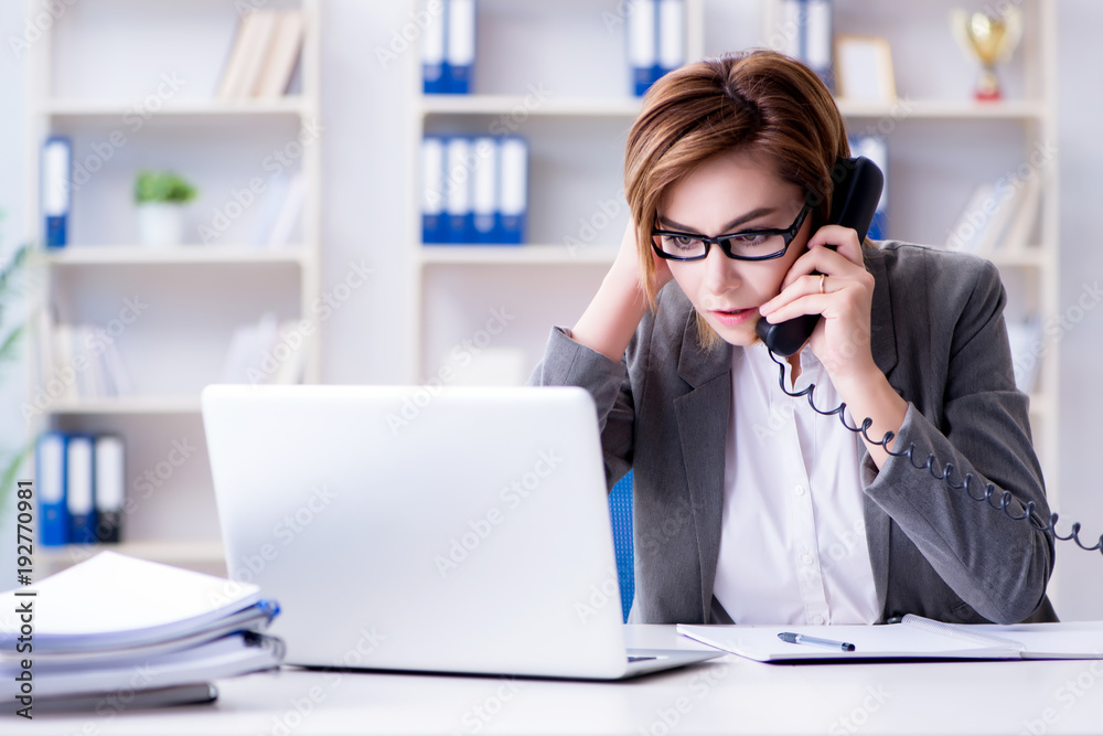 Businesswoman working in the office Businesswoman working in the office
