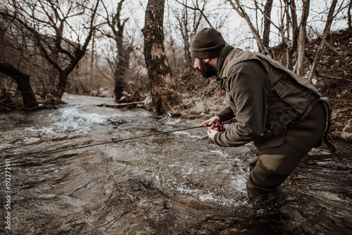 Fotografija trout fisherman in Italy