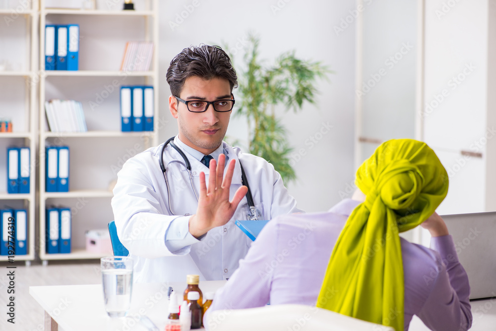 Doctor talking to cancer patient in hospital Doctor talking to cancer patient in hospital