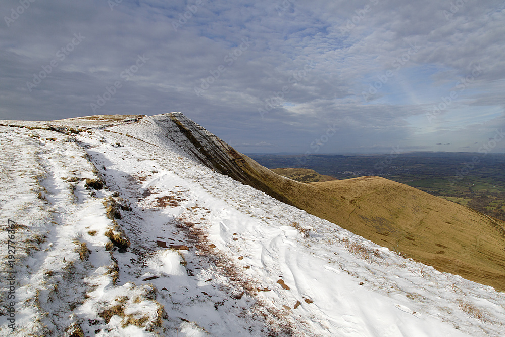 Pen y Fan and Corn Du are the highest mountains in the Brecon Beacons National Park - with winter snow. - obrazy, fototapety, plakaty 