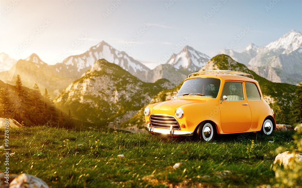 Cute little retro car on grass field at mountain in summer day.