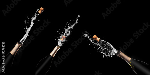 Champagne bottle and spray on black backgroun.set 3