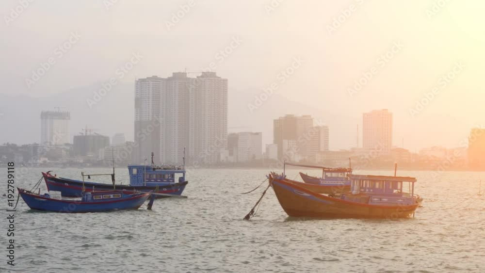 Anchored boats at Nha Trang Bay, the South China Sea Anchored boats at Nha Trang Bay, the South China Sea