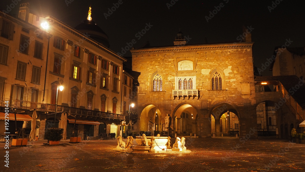 Bergamo - Old city (Citta Alta). One of the beautiful city in Italy. Lombardia. Landscape on the old main square (called Piazza Vecchia), the ancient Administration Headquarter and Contarini fountain