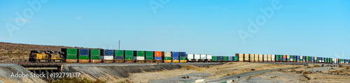 Photography Long Cargo trains passing by in mirage, California USA