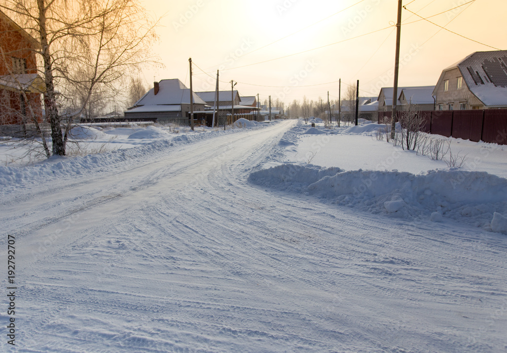 Road in the snow in the village