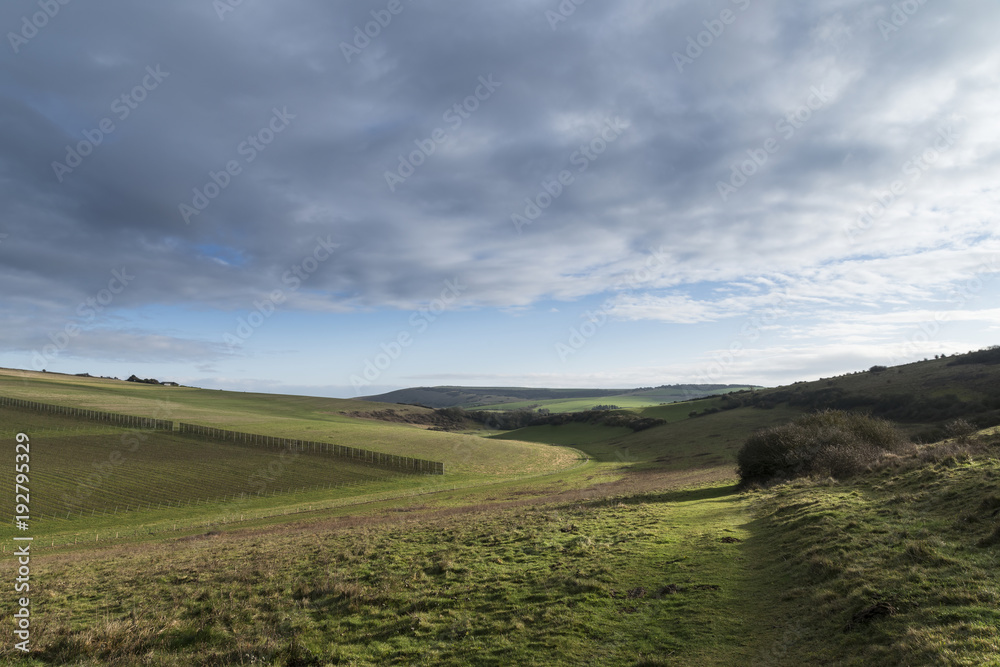 Stunning English countryside landscape across rolling green hills
