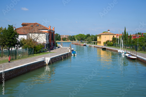 A sunny day on the central canal of the Mazzorbo island. Venice, Italy