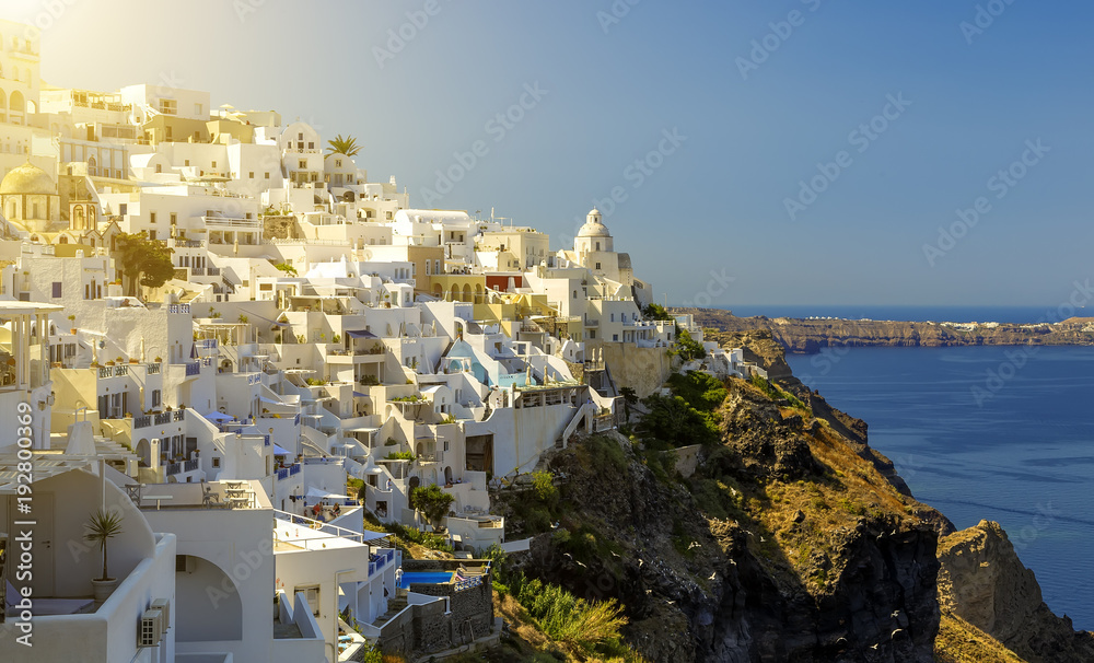 Sunny morning view of Santorini island. Picturesque spring scene of the famous Greek resort Fira, Greece, Europe. Traveling concept background. Instagram filter toned.