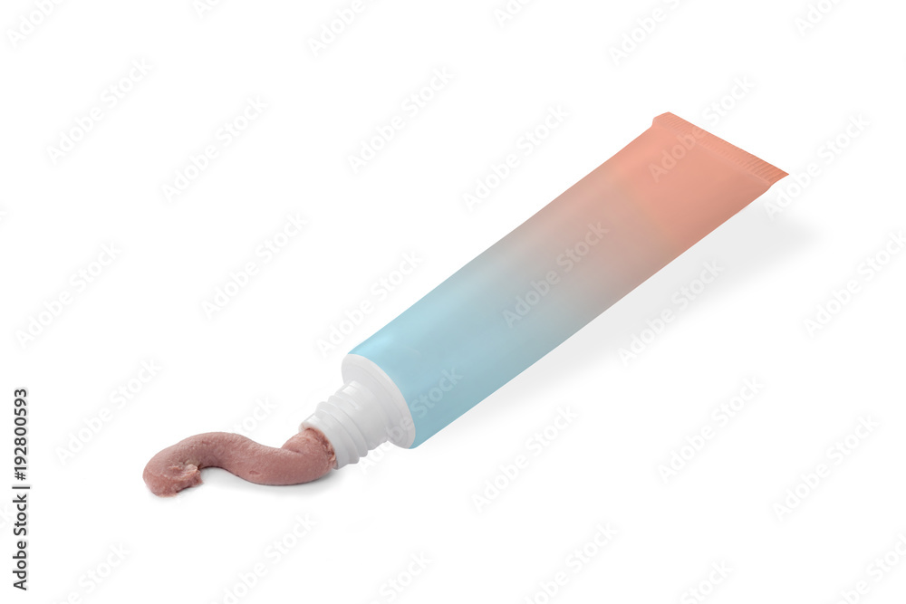Colorful tube with pink cream on a white background