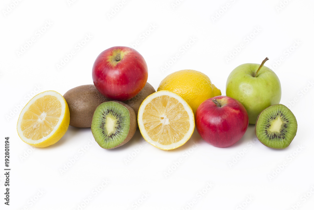 Fruits in a composition on a white background. Lemon with apples and kiwi on white background. Fruits with carrots on a white background. Fruits in a composition on a white background. Lemon with apples and kiwi on white background. Fruits with carrots on a white background.