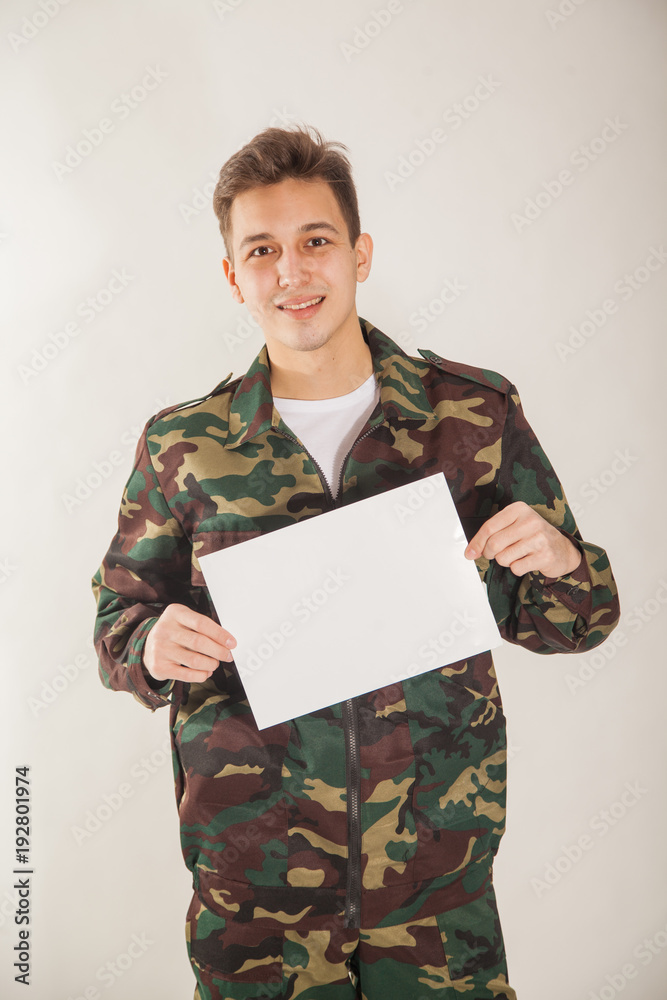 Man In Military Uniform, Camouflage, Isolated White Background Stock Photo,  Picture and Royalty Free Image. Image 72601481.
