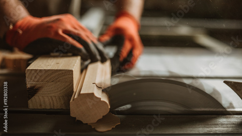 carpenter works with manual and electric equipment