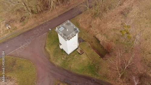 Circular flight over an old border tower of the border between the GDR and the FRG, open-air museum at Kaiserwinkel, aerial photo with the drone   photo