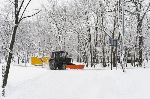 Tractor clears the snow