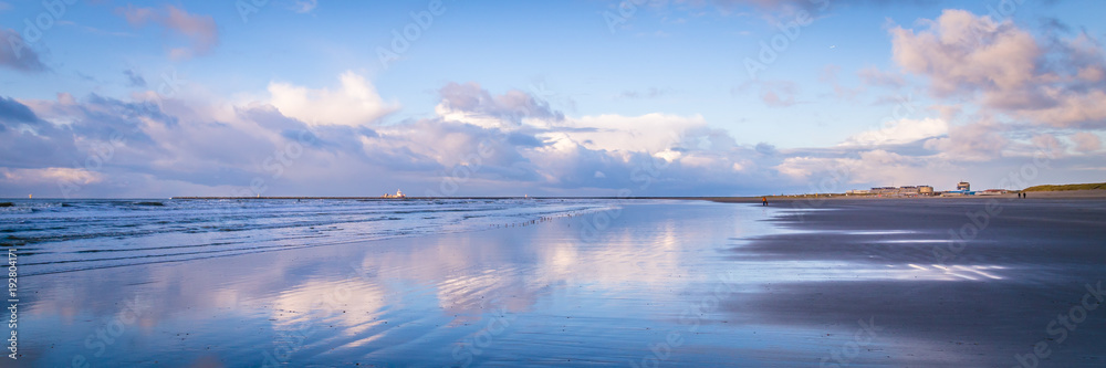 Walking along the beach during sunset in IJmuiden the Netherlands, Walking along the beach during sunset in IJmuiden the Netherlands,