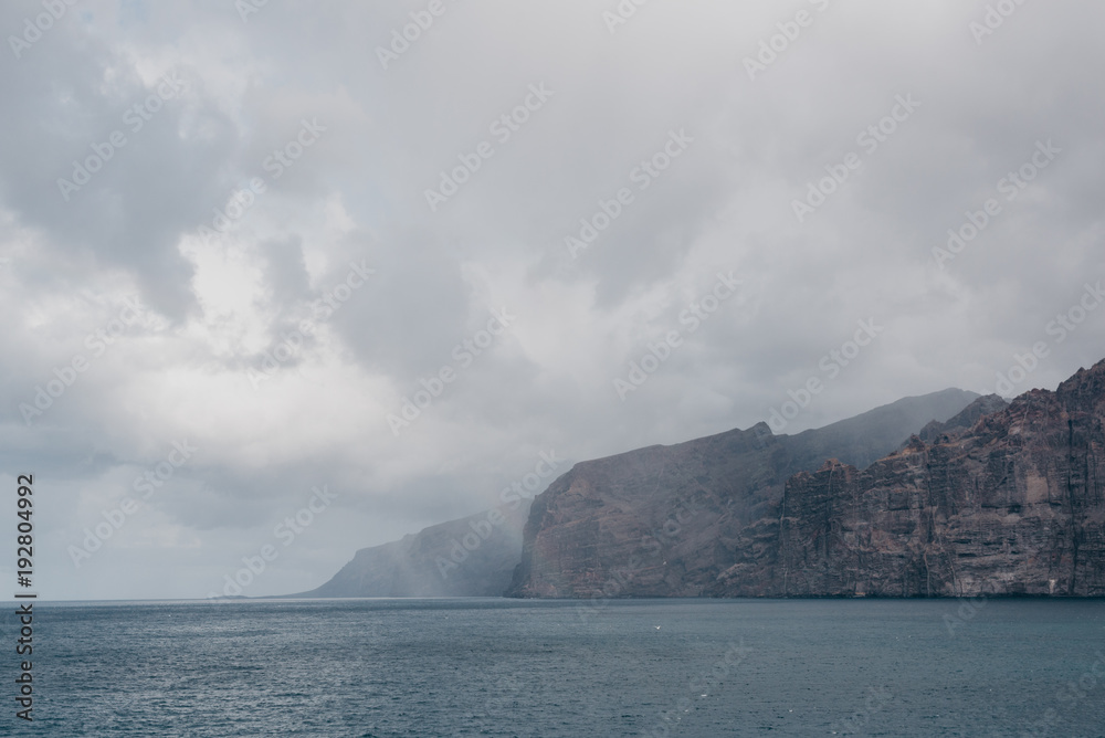Rain in the harbor near the cliffs. Los Gigantes Tenerife