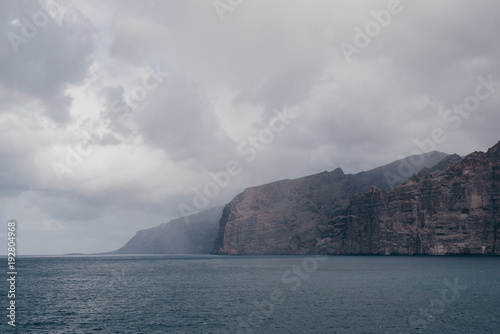 Rain in the harbor near the cliffs. Los Gigantes Tenerife © Roman Tyukin