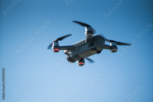 Fototapeta Naklejka Na Ścianę i Meble -  Mini drone flying in the sky