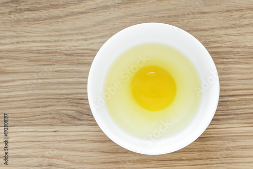 Raw egg in a bowl