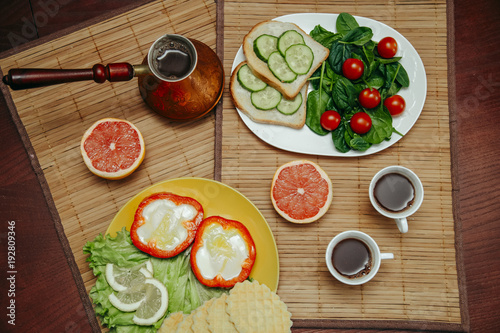 natural and healthy breakfast with toast, coffee and vegetables for vegetarian