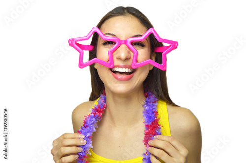 Happy birthday concept. Smiling girl with big star glasses and garland in birthday or carnival party isolated on white background.