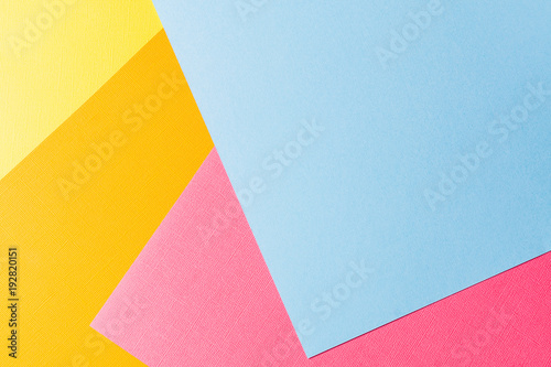 Pastel creative colors paper background, view from above.