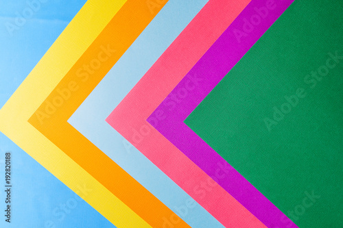 Pastel creative colors paper background, view from above.