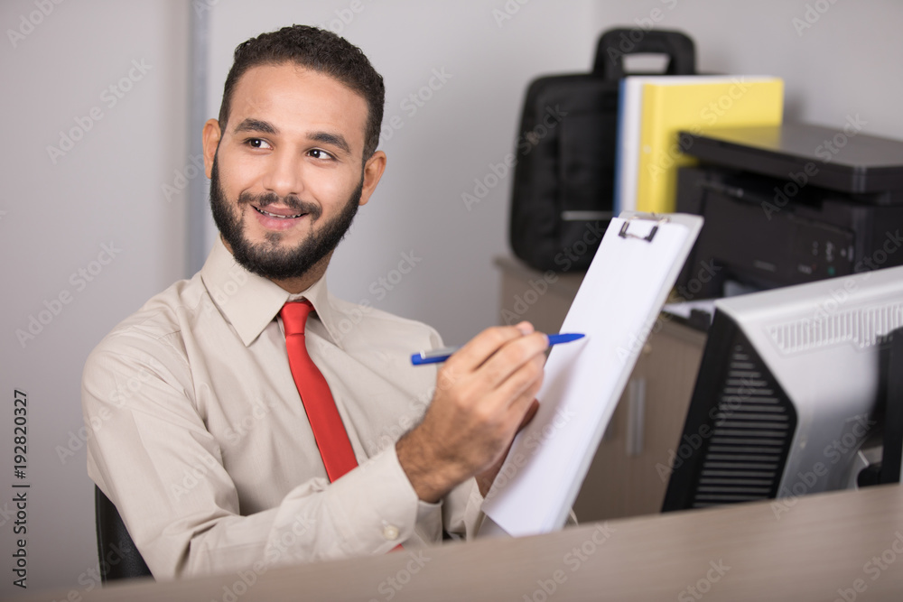 pointing at the clipboard