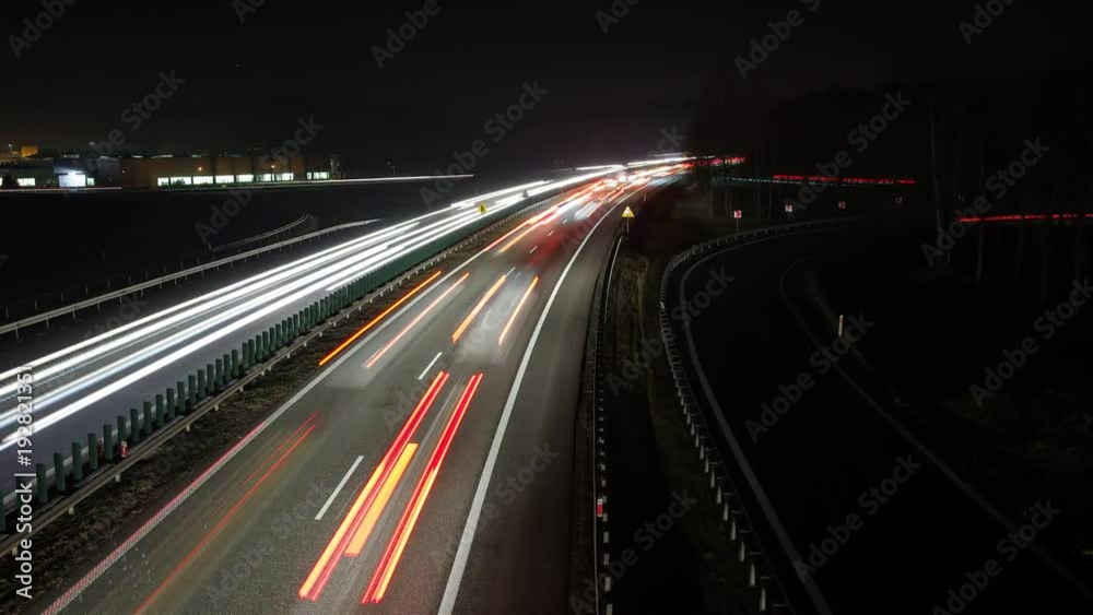 Time lapse traffic at night, highway junction in Krakow, Poland Time lapse traffic at night, highway junction in Krakow, Poland