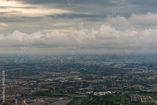 view from airplane to land with cloud