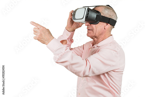 Grandfather is looking at the VR sunglasses, gestures with his hands, isolated on a white background.