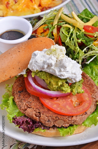 Beef Burger with roated onion and tomato photo