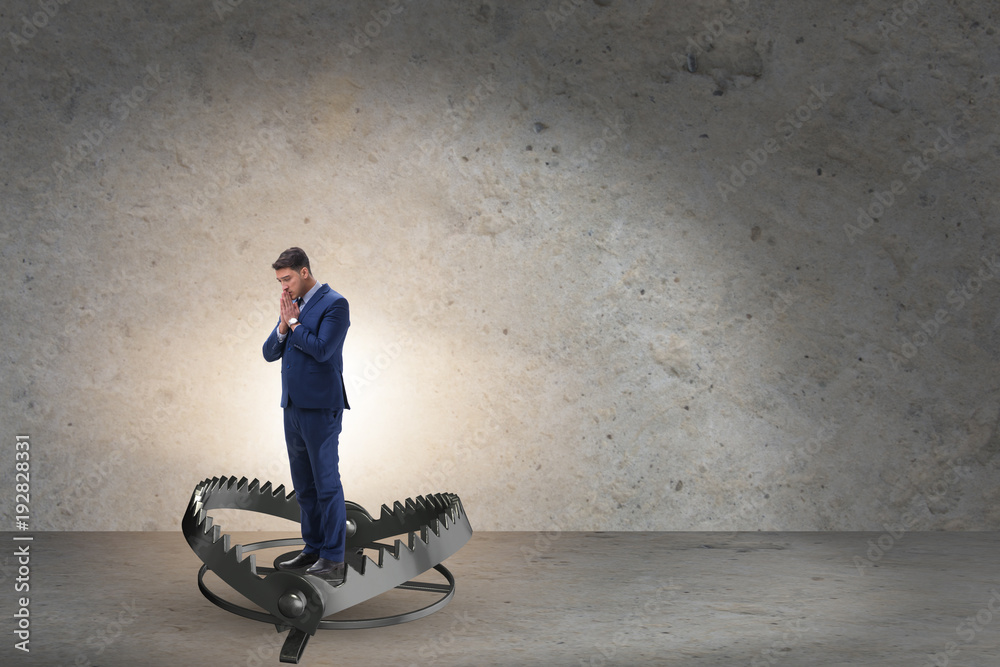 Man caught in mouse trap in risk business concept StockFoto Adobe Stock