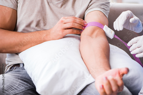 Patient getting blood transfusion in hospital clinic