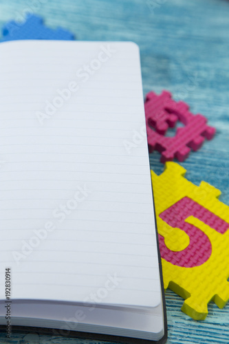 education concept on blue wooden background