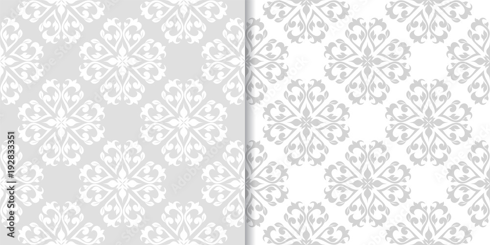 Light gray floral backgrounds. Set of seamless patterns Light gray floral backgrounds. Set of seamless patterns