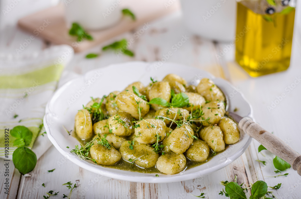 Pesto gnocchi, garlic and fresh herbs olive oil