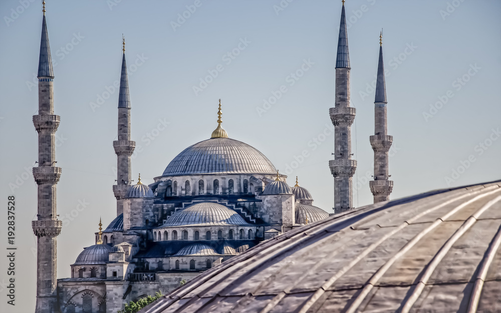 Sultan Ahmed Mosque (Blue Mosque) in Istanbul under the blue sky. The shot made from Hagia Sophia