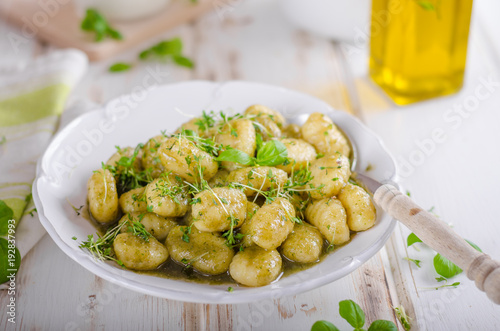 Pesto gnocchi, garlic and fresh herbs olive oil