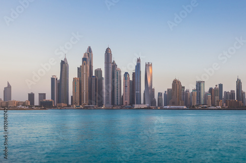 Scenic view of sunset over Dubai Marina Skyscrapers, View from Palm Jumeirah, United Arab Emirates. © GT-Films